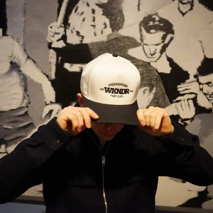 A Black Vintage Hat from the Vintage Threads collection by Weekender Hat Co. being worn at The Princess Cinema in Waterloo