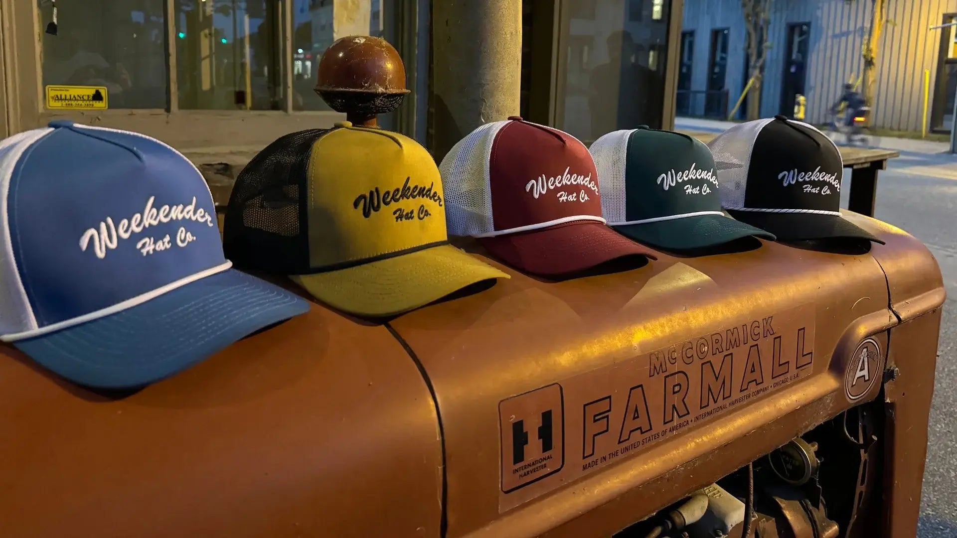 'The Classics" trucker hat collection on a tractor - Weekender Hat Co.